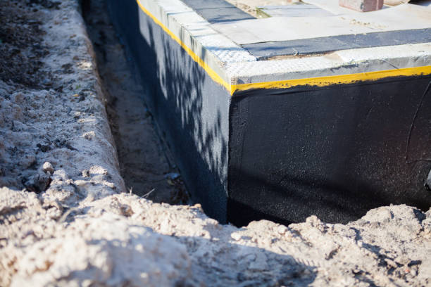 Professional Interior Drainage System technician working in Oostburg, WI